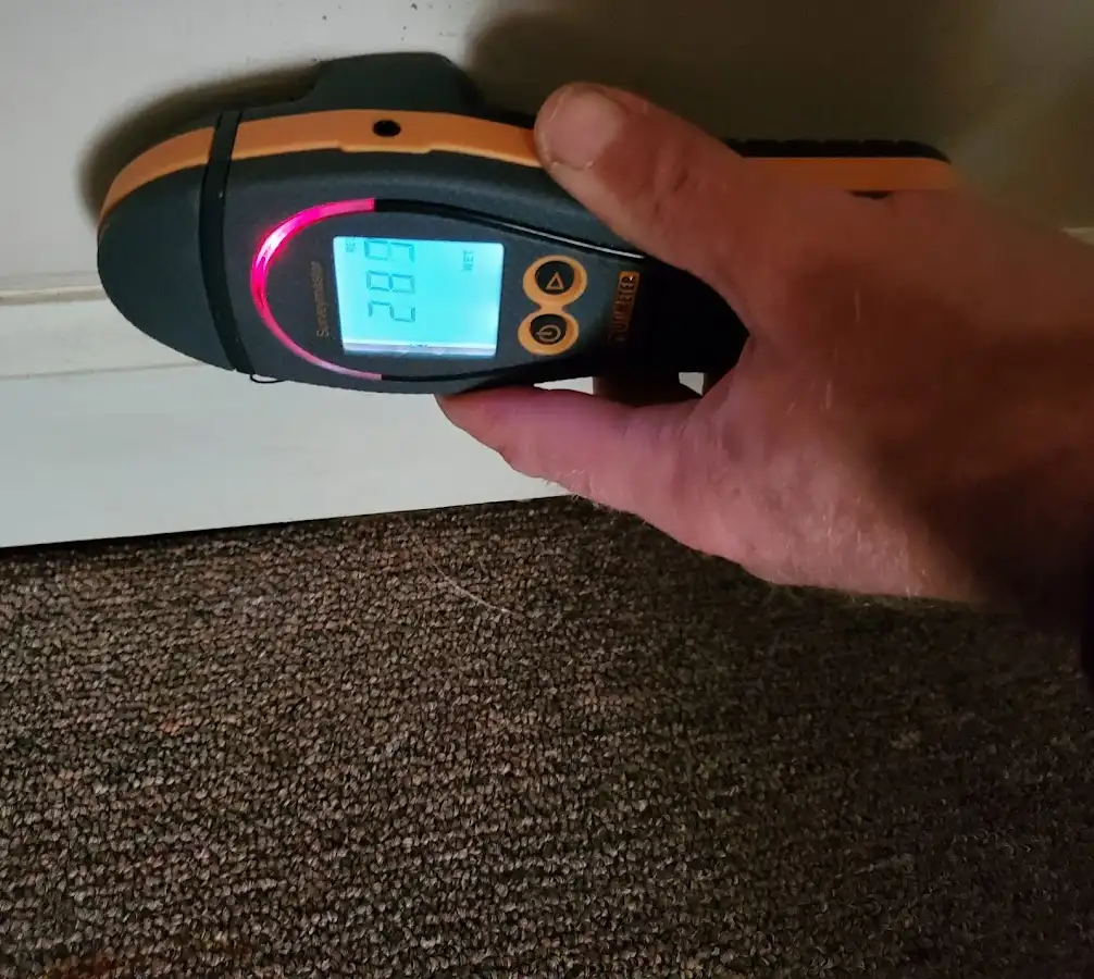 Moisture detection at baseboard during Storm Damage Restoration in Bluffton